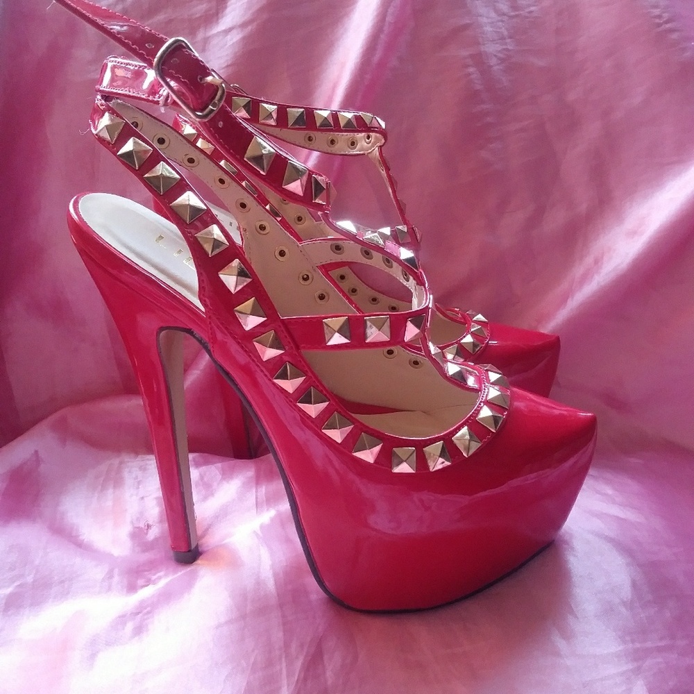 Red patent leather rockstud heels